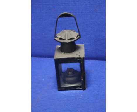 AN ANTIQUE RAILWAY LAMP
