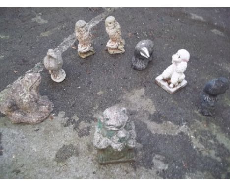 A SELECTION OF 8 GARDEN STATUES