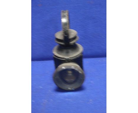 AN ANTIQUE RAILWAY LAMP 