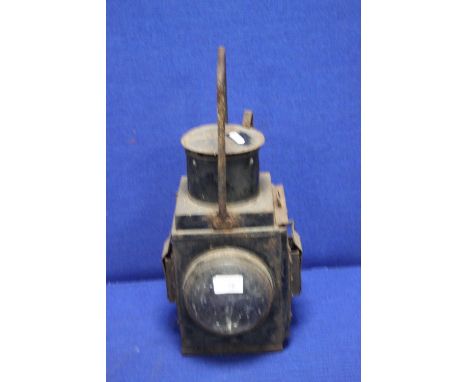 AN ANTIQUE RAILWAY LAMP
