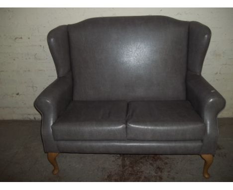 A MODERN 2 SEATER SOFA 