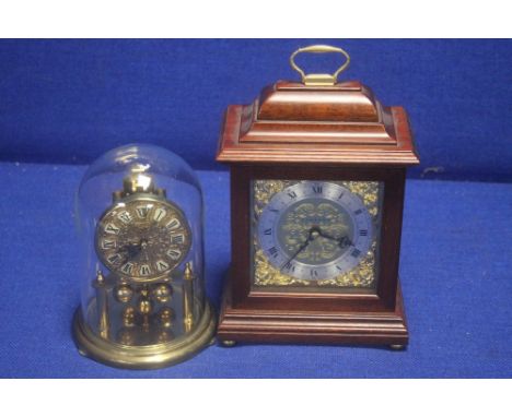 A KUNDO DOME CLOCK TOGETHER WITH A MANTLE CLOCK