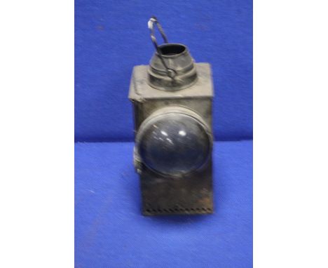 AN ANTIQUE RAILWAY LAMP