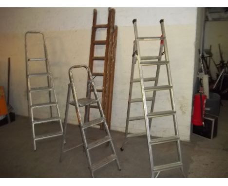 THREE SETS OF ALUMINIUM STEP LADDERS AND 1 SET OF TRIPPLE WOODEN LADDERS
