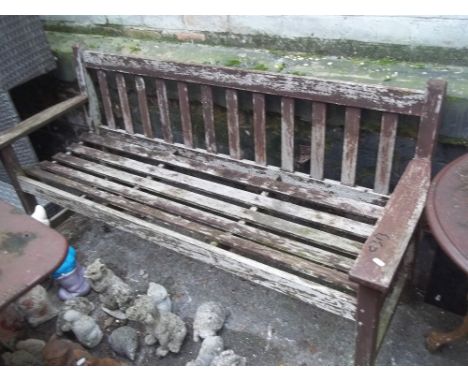 A HARD WOOD GARDEN BENCH