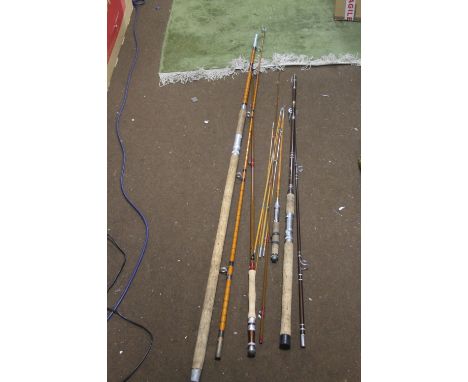 A COLLECTION OF VINTAGE FISHING RODS