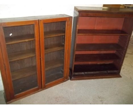 A SOLID GLAZED BOOKCASE AND A BOOK SHELF