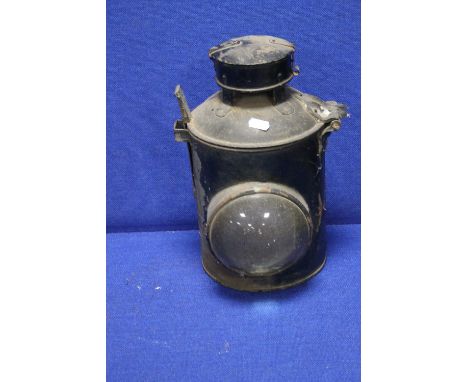 AN ANTIQUE RAILWAY LAMP 