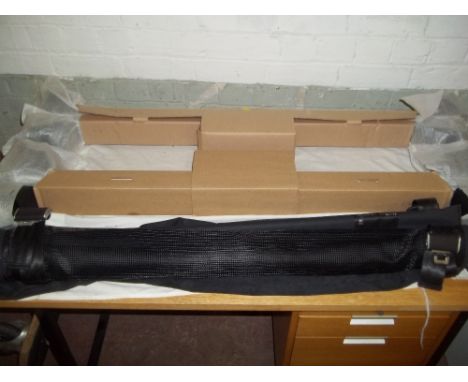 A BOXED AUDI LADDER ROOF RACK AND VEHICLE DIVIDER