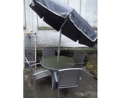 A GARDEN SET GLASS TABLE AND 4 CHAIRS WITH PARASOL