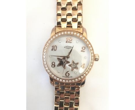 A boxed ladies Rotary part-skeleton wristwatch with pearlescent dial, Arabic numerals, white stones and star cut outs, with w