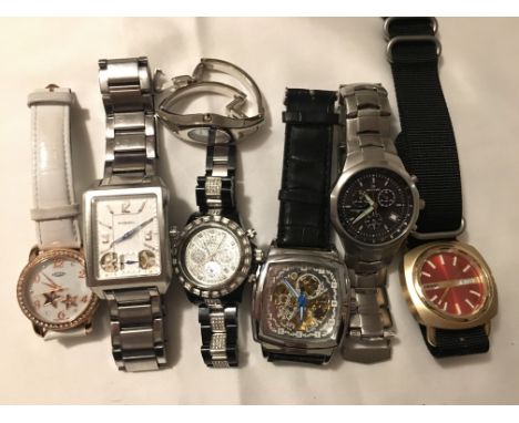 A bag of seven assorted watches including Rotary and Fossil.