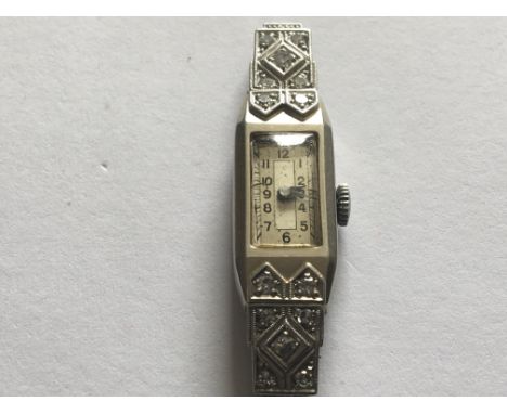 An 18ct white gold and diamond set vintage Cocktail Watch. Working order.
