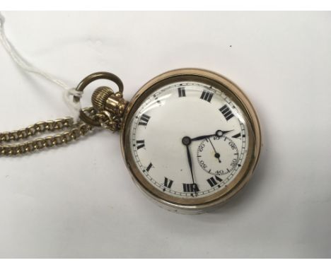 A gold plated button wind pocket watch with attached chain the enamel dial with Roman numeral