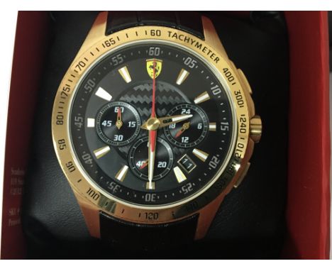 A Gents designer Ferrari Watch, and two swatch watches including a Chronograph watch (3) not seen working.