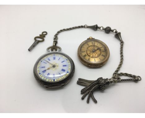 A small 14ct gold fob watch and a silver button wind watch.