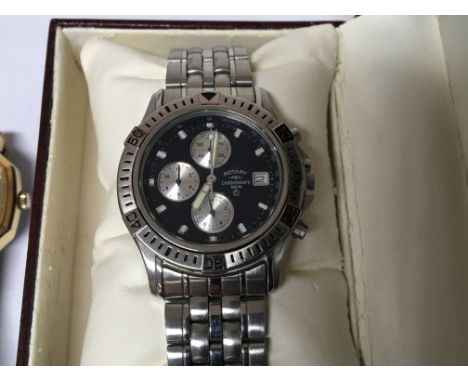 A Gents Rotary Chronograph in a fitted case one other Gents Rotary watch and a designer Gianni Ricci Watch (3)