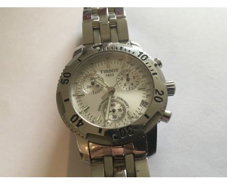A Gents Tissot. Stainless steel Chronograph 200M Watch modern design silvered dial working order with box paperwork extra lin