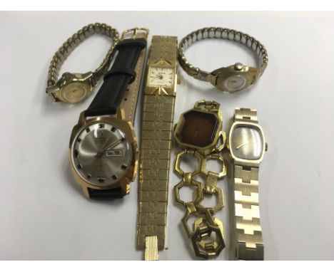 A collection of vintage wristwatches including omega automatic