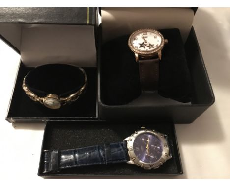 Three boxed wristwatches including Rotary.