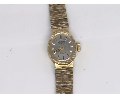 A 9ct Gold ladies Rotary watch with an oval dial in original box.