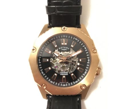 A gents boxed Rotary 1895 edition auctomatic wristwatch, part skeleton, number 14644, dial in decagonal form, dial with baton