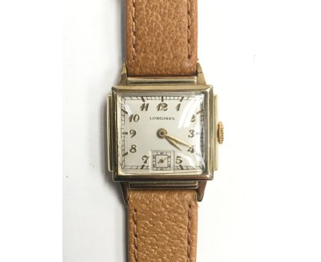 A boxed ladies vintage gold cased Longines wristwatch, the square dial presenting gold Arabic numerals and a subsidiary dial,