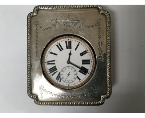 A Silver Watch Case with Birmingham hallmarks enclosing a Giant button wind pocket watch.