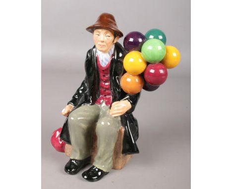 A Royal Doulton ceramic figure, The Balloon Man HN1954.  