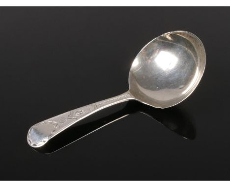 A George III silver caddy spoon. 8g.  