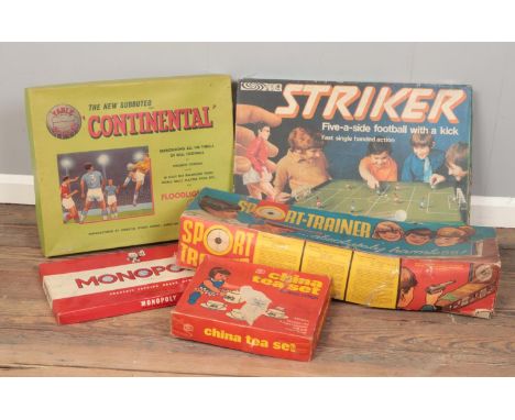 A collection of mostly vintage games. Monopoly, The New Subbuteo 'Continental', Striker, Sport trainer etc  