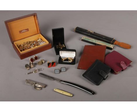 A collection of vintage gent's accessories. Cufflinks, tie pins, wallets, pen knife's etc  