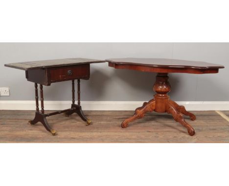 Two Mahogany tables. To include a mahogany coffee table with quarter veneer and inlayed top, along with a drop leaf sofa tabl