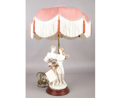 A Capodimonte style table lamp by Berger. With shade, 59cm height.  