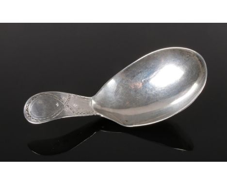 A George III silver caddy spoon. 6.4g.  