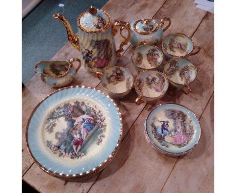 A 20 Pieces Tea Service with gold rim.