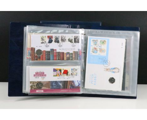 A collection of Royal Mail / Royal Mint Philatelic Numismatic stamp &amp; 50p coin covers enclosed within an official album. 