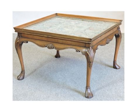 A carved walnut coffee table, with a tapestry inset top, 70 x 67cm