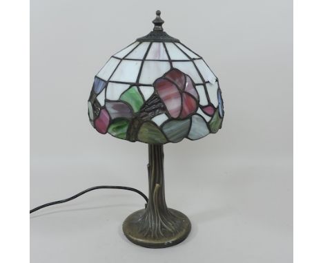 A Tiffany style leaded glass table lamp, 38cm tall, together with a similar ceiling light