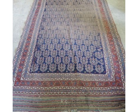 A Persian carpet, with all over designs, on a blue ground, 162 x 260cm