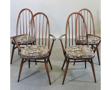 A matched set of twelve 1970s Ercol dark elm spindle back dining chairs