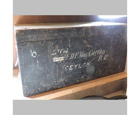 A painted pine trunk, with a metal lining and painted inscription, together with a large wicker basket
