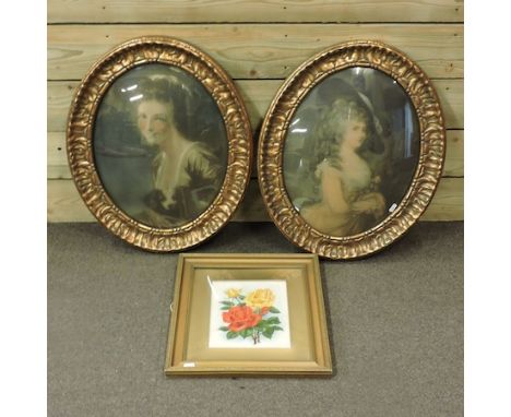 A pair of framed oval prints, together with a still life