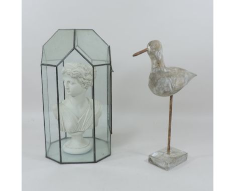 A Parian style portrait bust, in a glass display case, together with a painted wooden bird on stand, 38cm tall