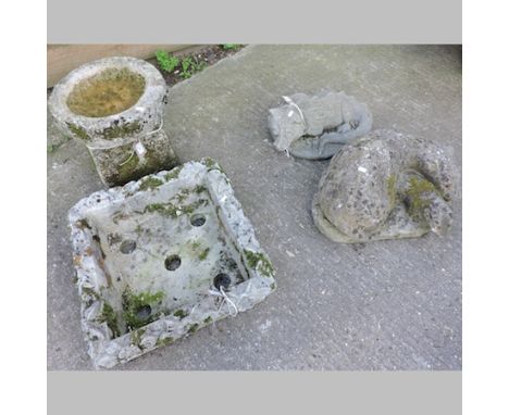 A reconstituted stone bird bath, together with a planter, and two garden figures (4)