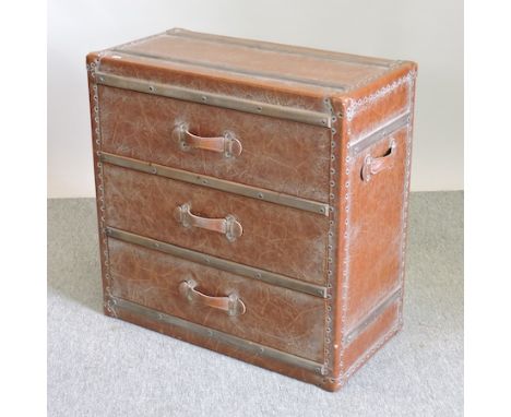 A modern leather three drawer chest, in the form of a cabin trunk, 76cm