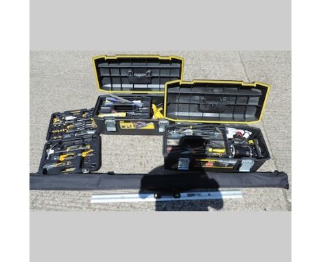 A JCB screwdriver set, cased, together with two large Stanley toolboxes containing various tools, to include a clamp and a sh