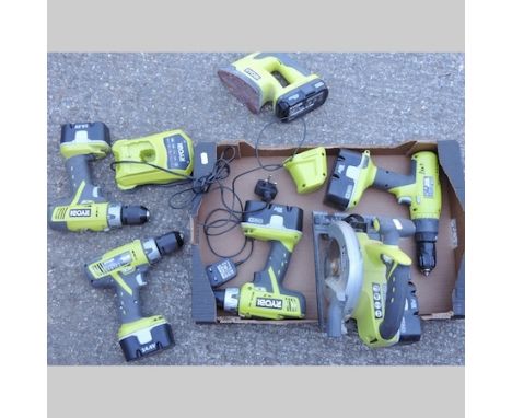 A collection of Ryobi power tools, to include four drills, a circular saw, and a sander, most rechargeable