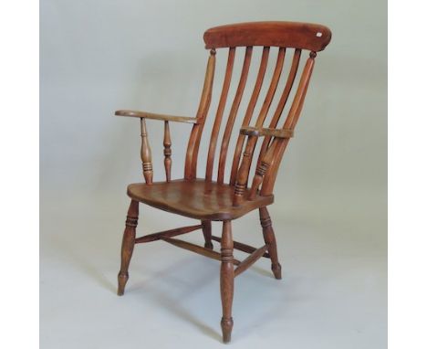 A splat back open armchair