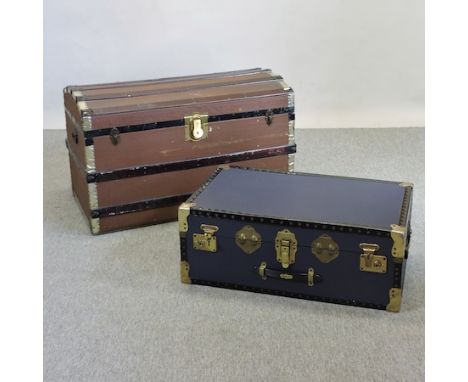 An early 20th century metal bound travelling trunk, 90cm, together with another smaller